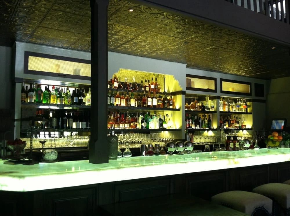 Lumastone on Backlit bar countertops.