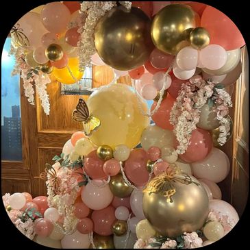 Transform your event with custom balloon décor, garlands, arches, and displays. Balloon Stylings