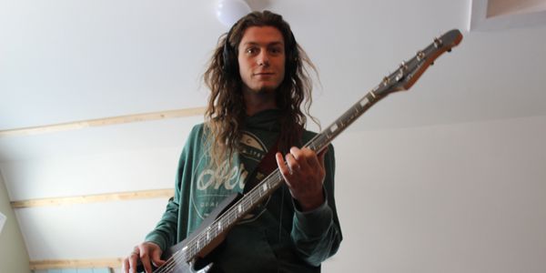 Atreya laying bass tracks.