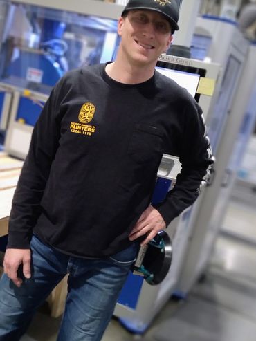 Kenny wearing his Cup Keeper suction cup holder.