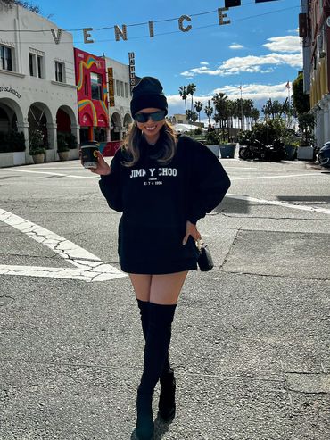 Beanie - Amazon.com
Sunglasses - Louis Vuitton
Sweater - Jimmy Choo
Boots - Marc Fisher 
Purse - Cha