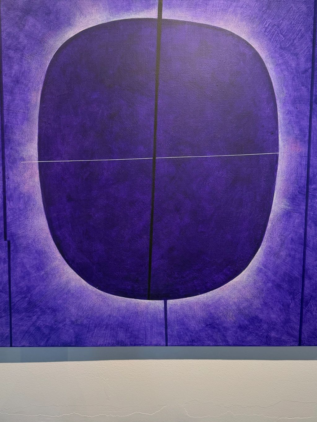 Abstract purple painting with intersecting lines.