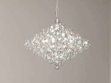 Dense clusters of crystals bedazzle the
streamlined forms of the Baronet pendant light.