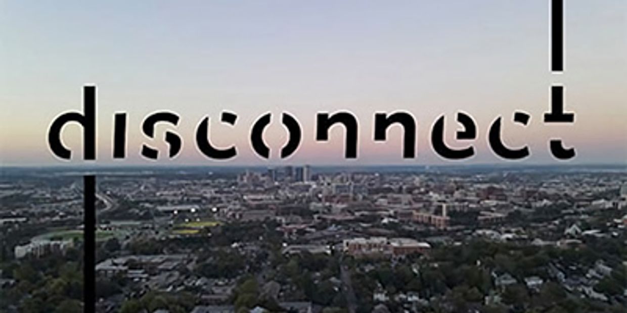 Cityscape of Birmingham, Al. The word "disconnect" appears in the foreground in stylized letters.