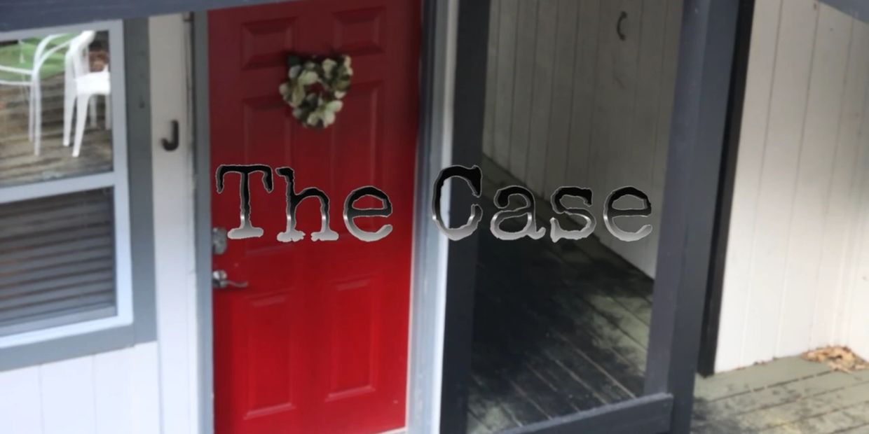 A red apartment door in an outdoor corridor. The words "The Case" appear in foreground.