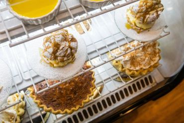 A display of cakes and pies