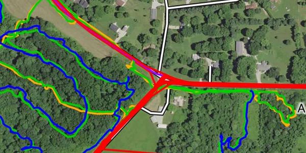 Aerial view with colored contour and road lines.