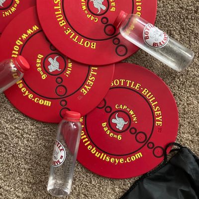 Red Bottle Bullseye game targets and bottles.  Positive Reviews on Bottle-Bullseye Game.