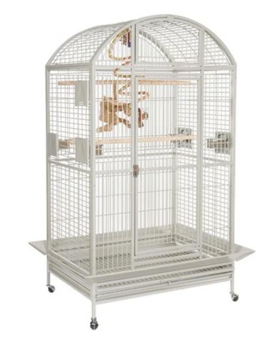 Large white metal birdcage with arched top and wooden perches.