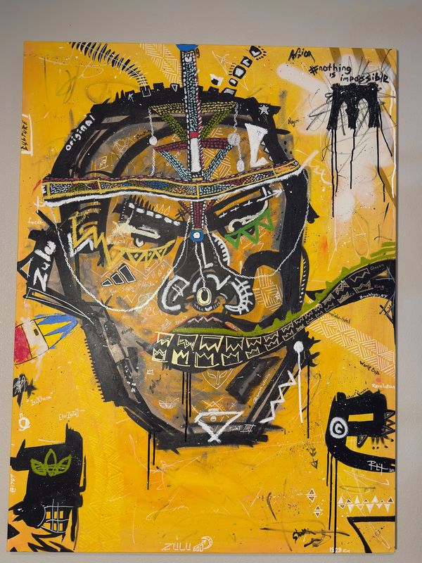 Abstract graffiti-style portrait with bold yellow and black colors.
