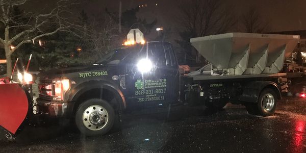 Our plow truck spreading salt on a cold winter morning.