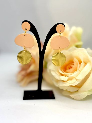 Peach textured circle dangle earrings
