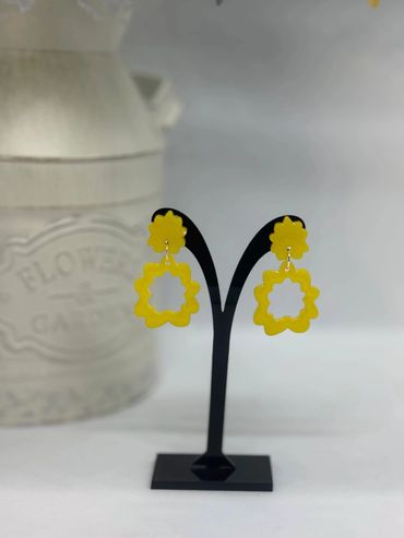 Bright yellow floral shaped earrings