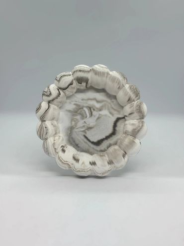 Swirled grey white concrete decoration