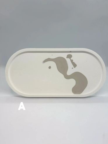 Oval white tray with brown abstract