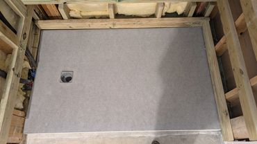 Custom shower framing and shower pan installation.