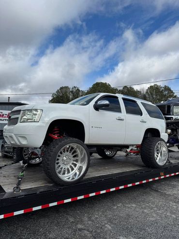 Built 2008 Chevy Tahoe with a 7-9" FTS custom powder lift, sitting on 26x16 Fenix Forged Wheels.
