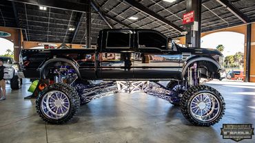 2008 f250 6.4l Show Truck sitting on a 28" fully custom lift. 28" Fenix Forged Wheels