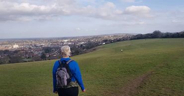 Walking along the Mount with Guildford skyline in the background, Hogs Back, Surrey Hills