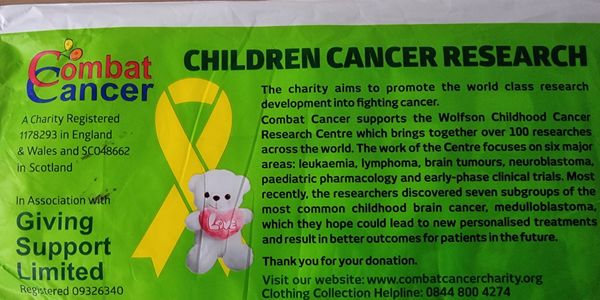 Banner promoting Combat Cancer charity for children's cancer research.