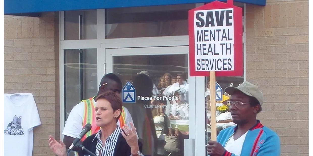 Francie Broderick, one of the original GHF Housing Fighters, advocating for mental health services.