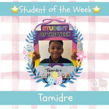 Student of the Week Tamidre holding a colorful frame with flowers and Easter eggs.