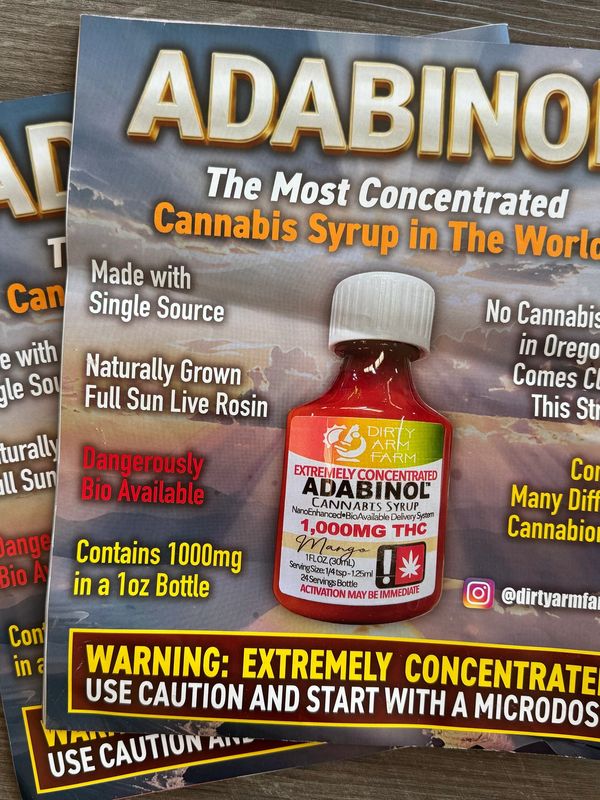 Adabinol cannabis syrup with 1000mg THC and caution warning.