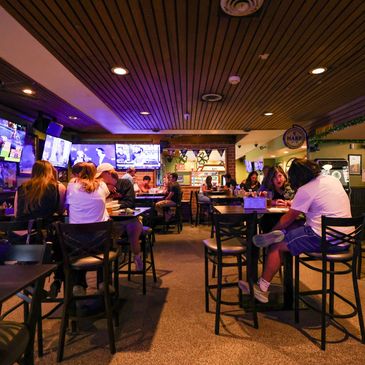 Dining room inside Molly's Irish Grille & Sports Pub with tables and seating