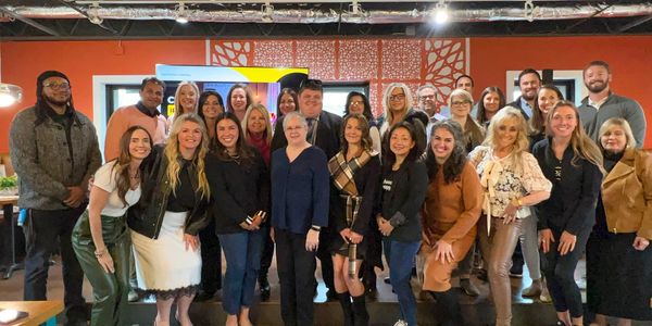 Real Estate Agents learning new-construction sales strategies at a Builder Collective