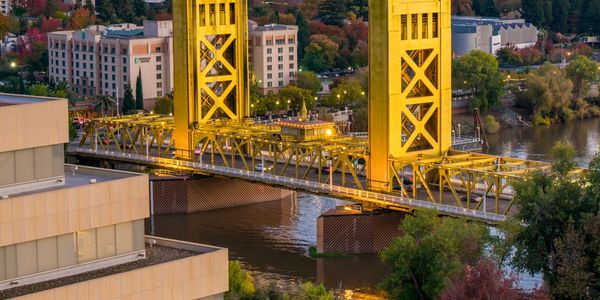 e.g;
alt=" Tower Bridge Sacramento Skyline'

Cityscape by Leo_Visions