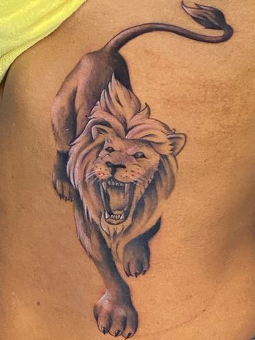 Trigger Jo Austin Texas black and grey tattoo, fine line tattoo, lion rib tattoo 