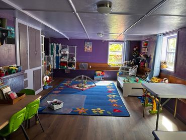 Main playroom/classroom. New flooring and new paint colors.