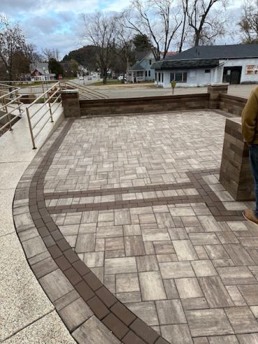 Newly paved stone patio with a brown border.
