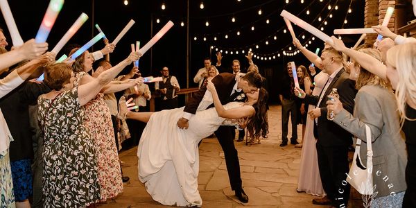 Wedding send off in the mountains;
market lights on the wedding dance floor;
 outdoor wedding dancin