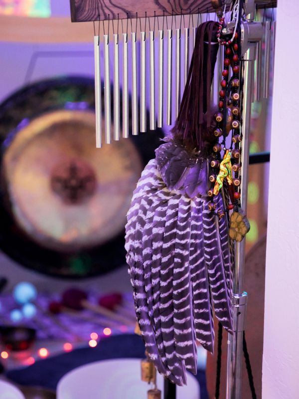 Decorative chimes with feathers and beads.