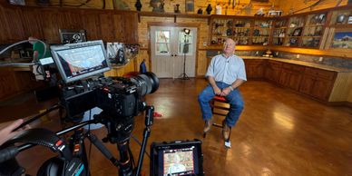 Interview pecan farmer with professional camera and gear