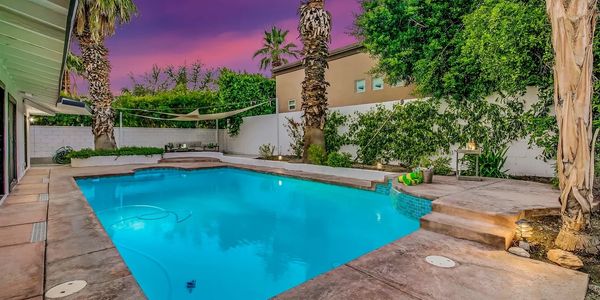 Sunset in the desert over pool