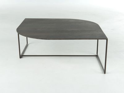 Modern low coffee table with dark wood top and thin metal legs.