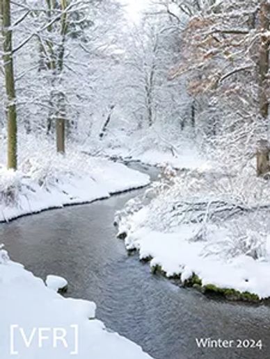 A literary magazine cover featuring a snowy landscape and icy river.