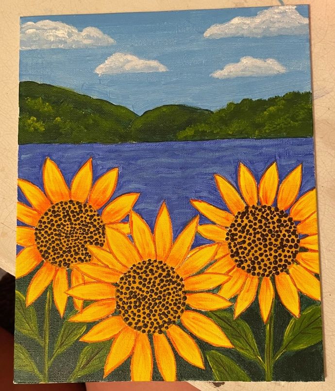 a painting of sunflowers on a lake background