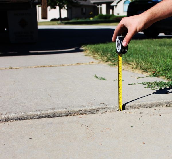 Sidewalk needing repair