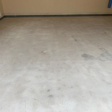This garage had stained concrete, no problem for our grinders we can still get it back to a clean sl
