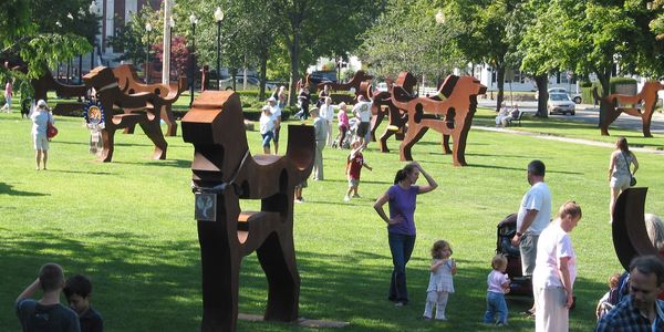 public art exhibit steel dogs, Dale Rogers metal sculpture, things to do, bone cut-out, Big Dog Show