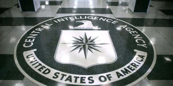 Seal of the CIA on a lobby floor.