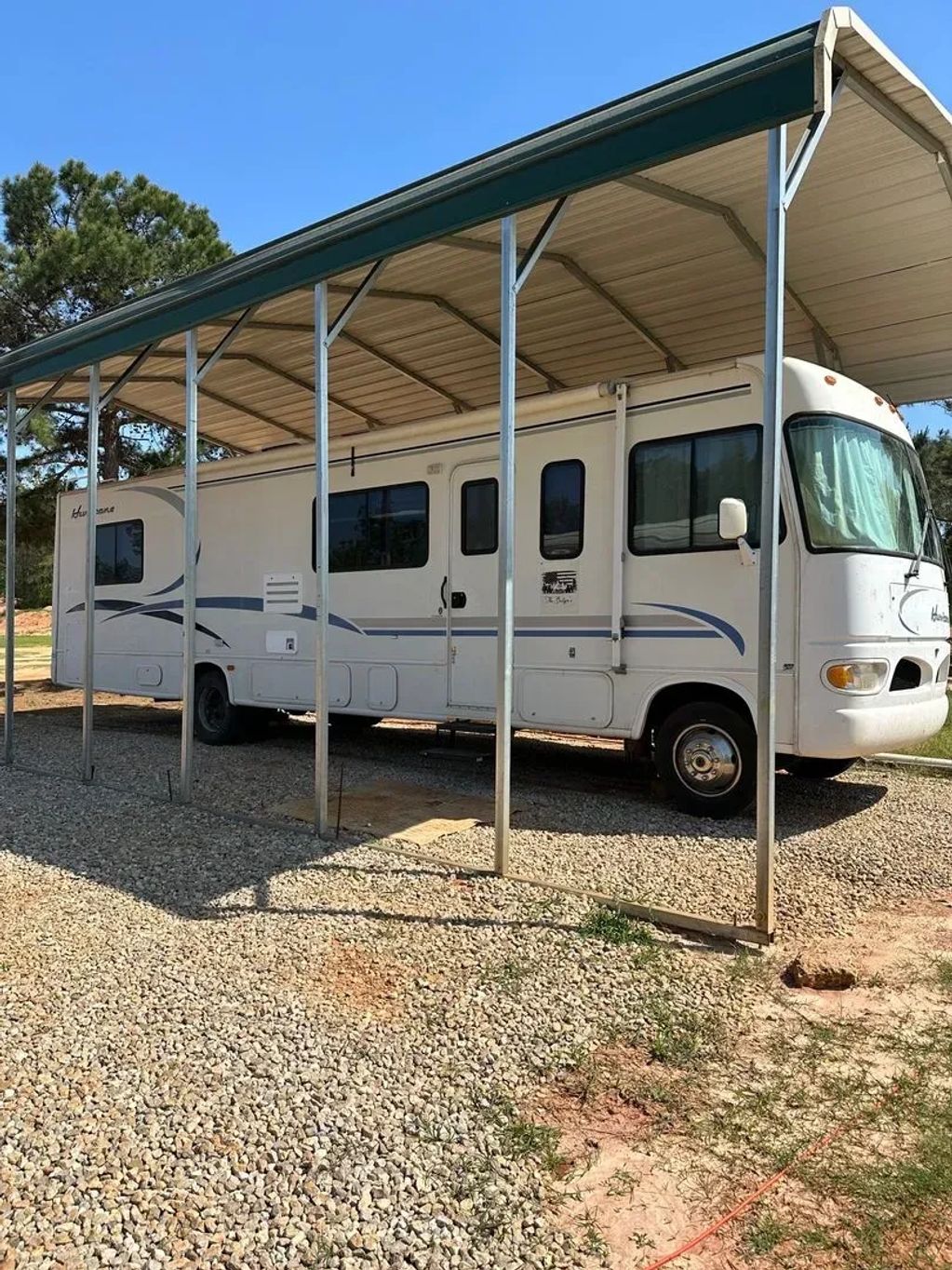 Motor home; Sleeps 6. Queen size bed in the rear, fold out table bed, and fold out couch bed.