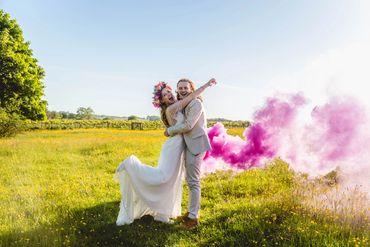 festival wedding in south wales with smoke bombs. Smoke bomb couples portraits. carmel mccabe 