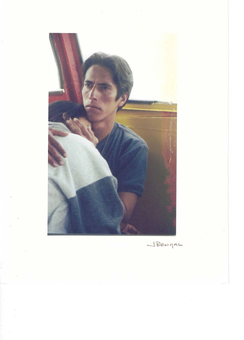 A man holding a person