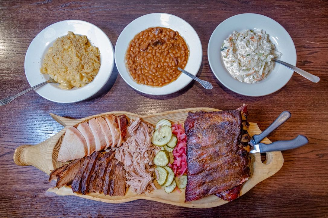 Full Feast - 1/2 pound of Beef Brisket, Pulled Pork, Turkey Breast, a Rack of Ribs, 3 Savory Sides, 