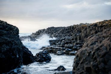 Waves crashing against the basalt columns of the Giant's Causeway.