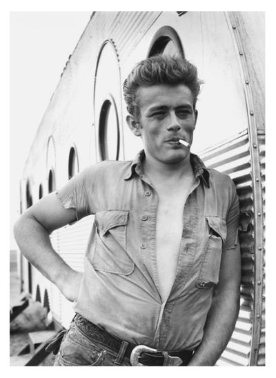 James Dean next to his Airfloat trailer during the filming of Giant 1956.